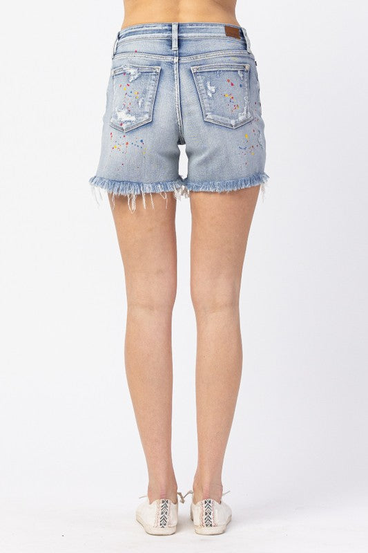 Rainbow Paint Splash Cutoff Shorts. Judy Blue Mid-rise.